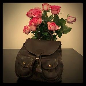 Vintage Dooney and Bourke leather duffle backpack